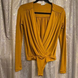 Free People Turnt Marigold Golden Stretchy Plunge Bodysuit Top XS